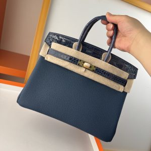 TouchBK; Size 25 Sapphire blue Togo leather and high-gloss crocodile leather Hand-sewn waxed thread All-steel hardware Goatskin lining